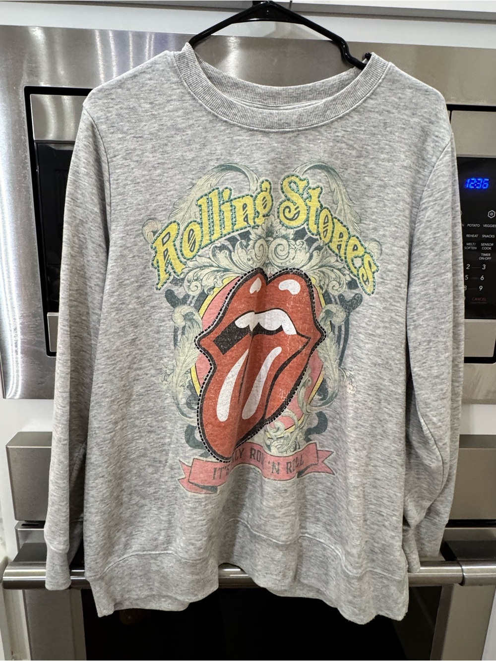 the Rolling Stones Gray Crewneck with Red Tongue Graphic and Yellow Script